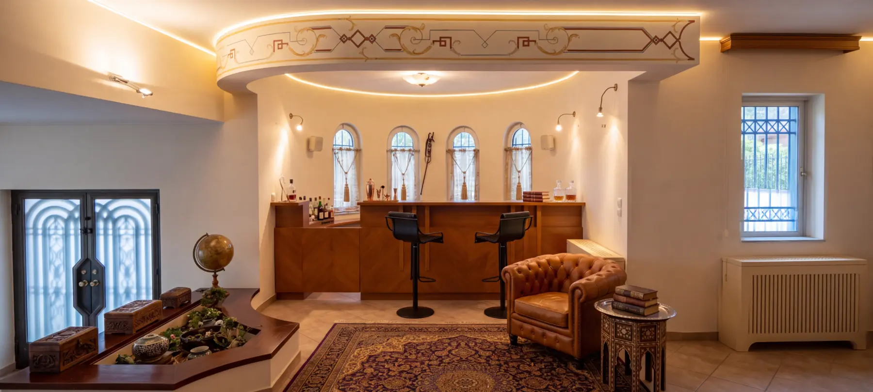 Private lounge and bar with arched windows
